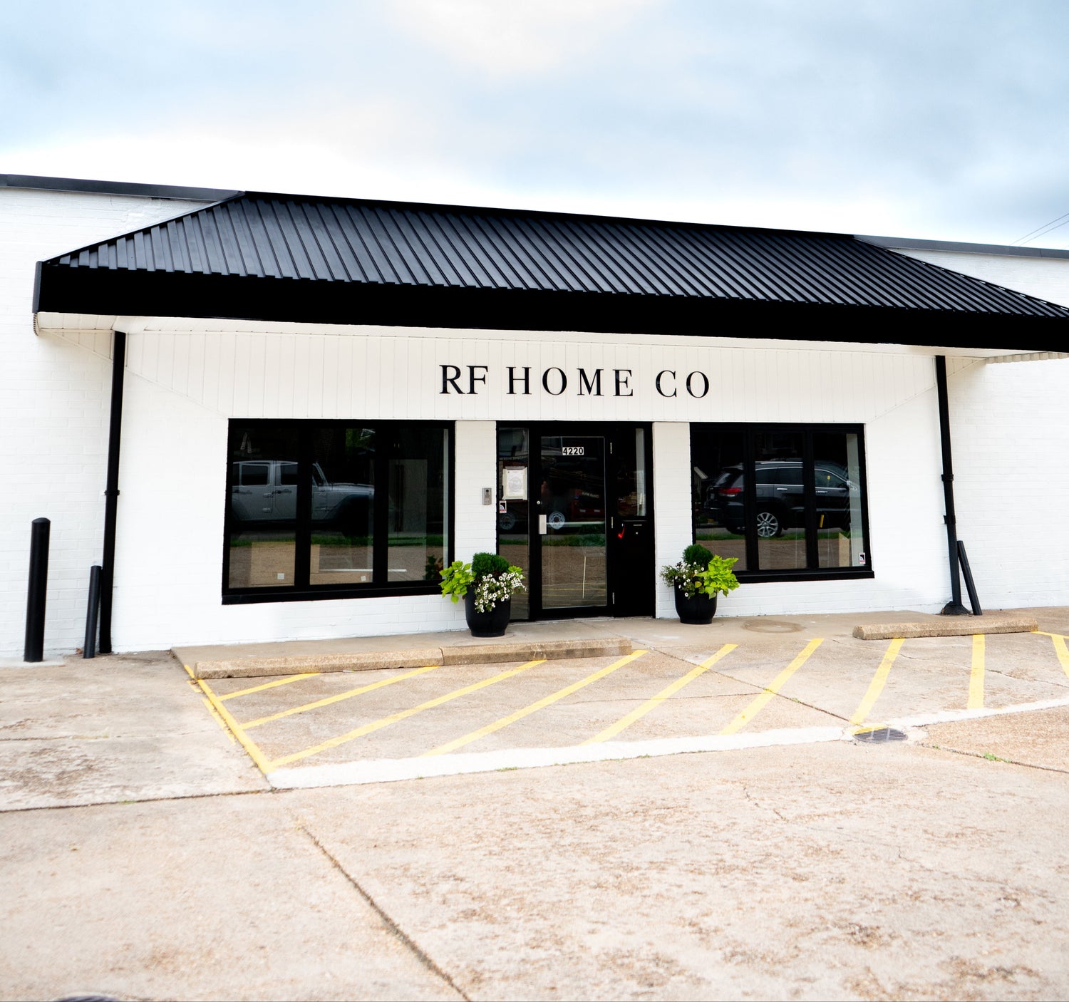 White building with RF Home Co sign